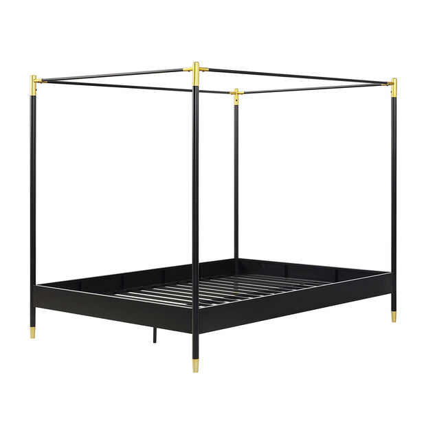 Black metal four-poster bed frame with gold accents on the corners and feet, shown against a plain white background.