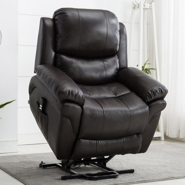 A black leather rise recliner chair in a living room, featuring padded armrests, a cushioned backrest with subtle vertical stitching, and a side pocket. The chair is elevated in the upright position.