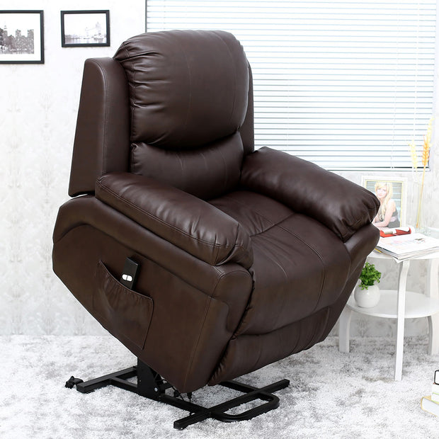 A dark brown leather rise recliner chair in a living room, featuring padded armrests, a cushioned backrest with subtle vertical stitching, and a side pocket. The chair is elevated in the upright position.
