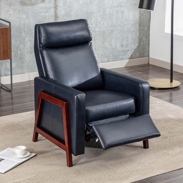 Blue leather push back recliner chair with a wooden frame, featuring a cushioned backrest and seat. The chair is partially reclined, set in a modern living room with wooden flooring and a beige rug.