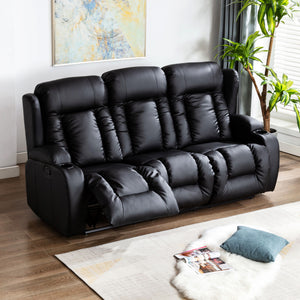 Black leather three-seater manual recliner sofa with one seat partially reclined, featuring cushioned backrests, cupholders, and vertical stitching, in a living room with wooden flooring and abstract wall art.