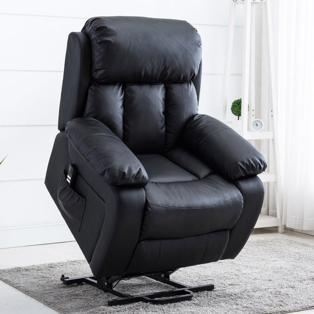 Black leather rise recliner, featuring padded armrests and a cushioned backrest with vertical stitching details, set in a living room.