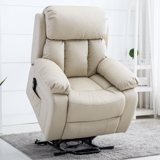 Cream-coloured leather rise recliner chair on a grey rug in a bright living space, featuring a small white shelf with books and a plant in the background.