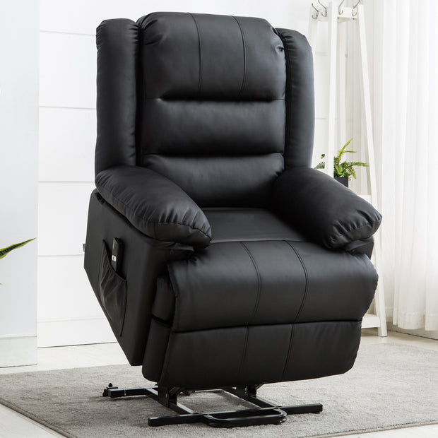 Black leather rise recliner chair with padded armrests and a side pocket, set on a grey rug against a white wall.