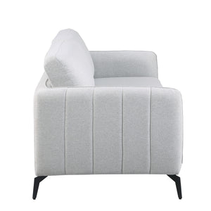 Side view of a light grey fabric sofa with black legs set against a white backdrop. The armrest features vertical stitching details.