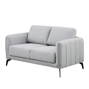 Light grey fabric sofa with black legs set against a plain white backdrop. The armrest features vertical stitching details.