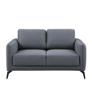 Dark grey fabric sofa with black legs set against a plain white backdrop.